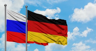 Russia and Germany flag waving in the wind